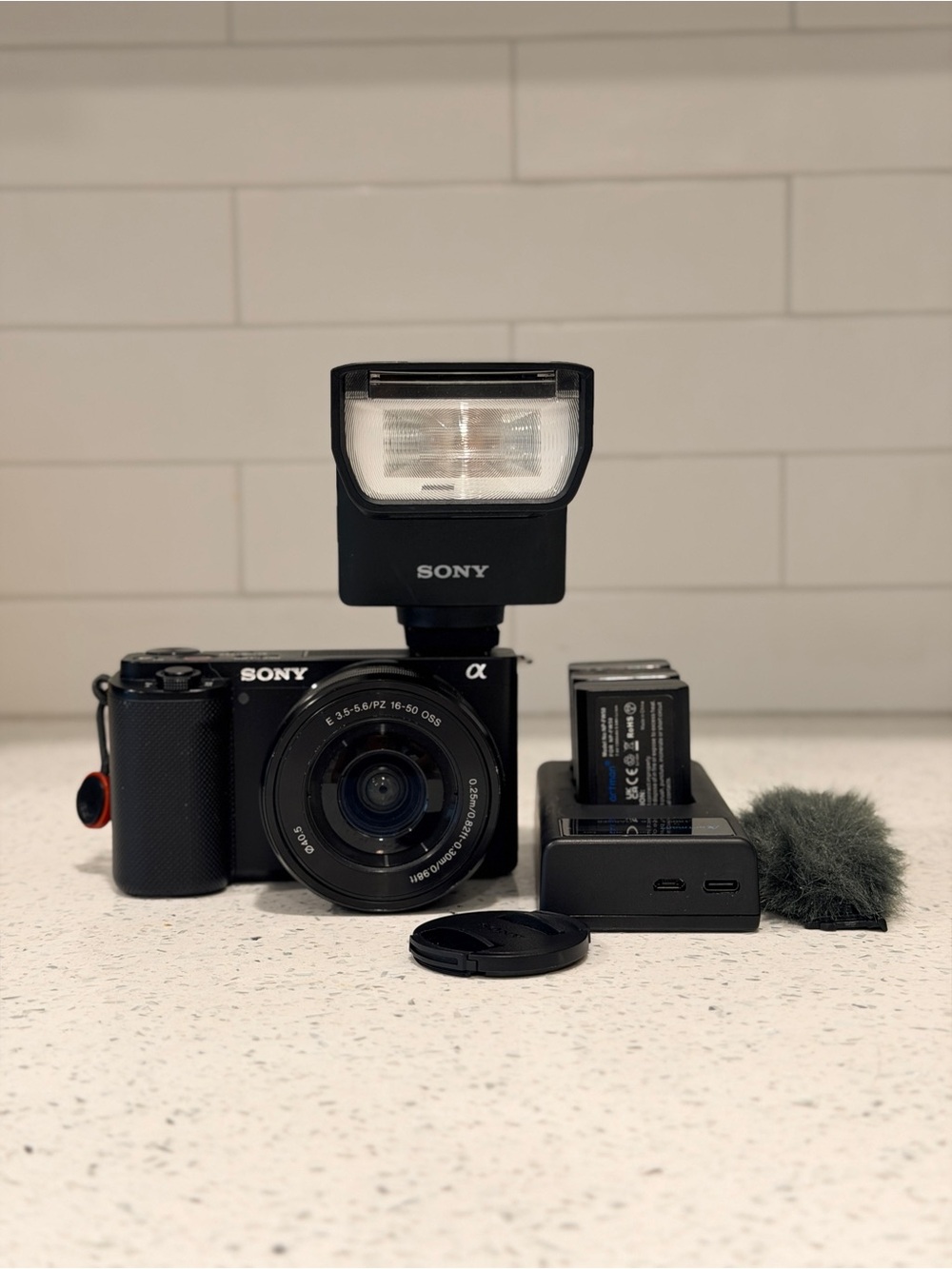 Sony ZV-E10 Mirrorless Digital Camera with External Flash Attachment